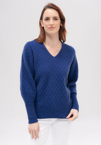 Possum and Merino  100205 Chloe Sweater - Featuring a flattering v neck and a beautiful knit structure, the Chloe V Sweater is the epitome of practicality and style.  With a flattering drop shoulder, gently blousoned sleeves, deep rib cuffs and waistband, it can be paired with the Chloe Snood to create a rollneck effect.