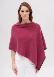 Possum and Merino  1623 Two Tone Poncho - One colour is never enough in this amazing one-size-fits-all wardrobe staple.  This easy throw-on piece can be worn various ways to create a host of different looks.  A touch of contrast tipping at the hem adds a little designer detail.