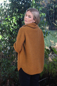 Possum and Merino.  9784 Stratus Cowl Neck Jumper - This feminine take on the chunky fisherman's rib jumper features a generous cowl neck and flattering curved hemline.   Made in New Zealand from a premium blend of 40% possum fur, 50% merino & 10% nylon.