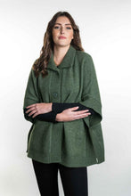 Load image into Gallery viewer, Possum and Merino  KO552 Cape with Pockets - An easy to wear piece which features ribbed trims, knitted-in pockets and beautiful textured buttons.  This garment is ideal for layering and is a relaxed fit.  Made proudly in New Zealand from a premium blend of 40% possum fur, 50% merino lambswool & 10% mulberry silk.