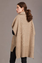 Load image into Gallery viewer, 5030 Step Hem Poncho - This comfortable and flattering poncho is available in three versatile neutral colour options. A step level hem and a small cowl neck set this poncho apart from the rest, and keep you warm in style. Can be worn loose or cinched with a belt of your choosing.