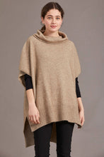 Load image into Gallery viewer, 5030 Step Hem Poncho - This comfortable and flattering poncho is available in three versatile neutral colour options. A step level hem and a small cowl neck set this poncho apart from the rest, and keep you warm in style. Can be worn loose or cinched with a belt of your choosing.