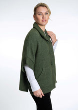 Load image into Gallery viewer, Possum and Merino  KO552 Cape with Pockets - An easy to wear piece which features ribbed trims, knitted-in pockets and beautiful textured buttons.  This garment is ideal for layering and is a relaxed fit.  Made proudly in New Zealand from a premium blend of 40% possum fur, 50% merino lambswool & 10% mulberry silk.
