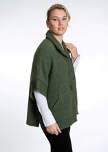 Load image into Gallery viewer, Possum and Merino  KO552 Cape with Pockets - An easy to wear piece which features ribbed trims, knitted-in pockets and beautiful textured buttons.  This garment is ideal for layering and is a relaxed fit.  Made proudly in New Zealand from a premium blend of 40% possum fur, 50% merino lambswool &amp; 10% mulberry silk.  