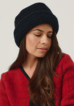 Load image into Gallery viewer, Possum and Merino

008009 Merinomink Felted Hat - A signature piece in the Merinomink collection, the Felted Hat fits perfectly. Offering a more dressed up look, it is an excellent choice for your winter escapes. A classic fit.

Made in New Zealand from an exclusive Merinomink blend of 50% ZQ Merino, 40% Brushtail possum and 10% Mulberry silk.