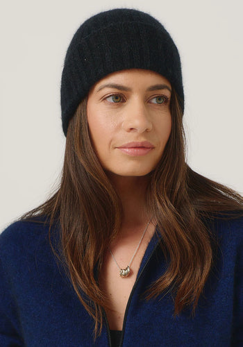 Possum and Merino

0527 Rib Beanie - A heater for your head, this fitted Merinomink beanie is big on cosiness, but light to wear. Rib detail and Merinomink branding add a touch of designer detail. A slim fit.

Made in New Zealand from an exclusive Merinomink blend of 50% ZQ Merino, 40% Brushtail possum and 10% Mulberry silk.