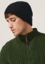 Load image into Gallery viewer, Possum and Merino

0527 Rib Beanie - A heater for your head, this fitted Merinomink beanie is big on cosiness, but light to wear. Rib detail and Merinomink branding add a touch of designer detail. A slim fit.

Made in New Zealand from an exclusive Merinomink blend of 50% ZQ Merino, 40% Brushtail possum and 10% Mulberry silk.