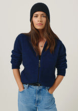Load image into Gallery viewer, Possum and Merino

0527 Rib Beanie - A heater for your head, this fitted Merinomink beanie is big on cosiness, but light to wear. Rib detail and Merinomink branding add a touch of designer detail. A slim fit.

Made in New Zealand from an exclusive Merinomink blend of 50% ZQ Merino, 40% Brushtail possum and 10% Mulberry silk.