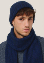 Load image into Gallery viewer, Possum and Merino

0527 Rib Beanie - A heater for your head, this fitted Merinomink beanie is big on cosiness, but light to wear. Rib detail and Merinomink branding add a touch of designer detail. A slim fit.

Made in New Zealand from an exclusive Merinomink blend of 50% ZQ Merino, 40% Brushtail possum and 10% Mulberry silk.