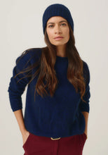 Load image into Gallery viewer, Possum and Merino

0527 Rib Beanie - A heater for your head, this fitted Merinomink beanie is big on cosiness, but light to wear. Rib detail and Merinomink branding add a touch of designer detail. A slim fit.

Made in New Zealand from an exclusive Merinomink blend of 50% ZQ Merino, 40% Brushtail possum and 10% Mulberry silk.