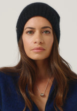Load image into Gallery viewer, Possum and Merino

0606 Slouchy Beanie - You asked, so here it is. A beanie with a bit more slouch! This roomy hat can be worn super slouchy, or roll the band up for a more fitted look. Featuring our Merinomink branding. A relaxed fit.

Made in New Zealand from an exclusive Merinomink blend of 50% ZQ Merino, 40% Brushtail possum and 10% Mulberry silk.