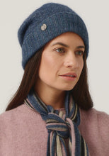 Load image into Gallery viewer, Possum and Merino

0606 Slouchy Beanie - You asked, so here it is. A beanie with a bit more slouch! This roomy hat can be worn super slouchy, or roll the band up for a more fitted look. Featuring our Merinomink branding. A relaxed fit.

Made in New Zealand from an exclusive Merinomink blend of 50% ZQ Merino, 40% Brushtail possum and 10% Mulberry silk.
