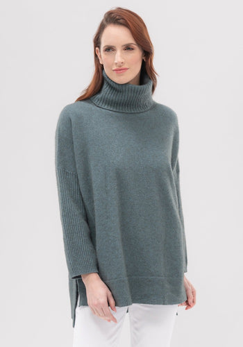 Possum and Merino   100138 Audra Cape Sweater - Sink into the sumptuous cosiness of the Audra. Designed with a relaxed fit and a soft roll neck, it has wide, ribbed sleeves and a dropped hem to keep you super warm and comfy.