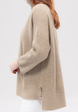 Load image into Gallery viewer, Possum and Merino   100138 Audra Cape Sweater - Sink into the sumptuous cosiness of the Audra. Designed with a relaxed fit and a soft roll neck, it has wide, ribbed sleeves and a dropped hem to keep you super warm and comfy.