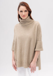Possum and Merino   100138 Audra Cape Sweater - Sink into the sumptuous cosiness of the Audra. Designed with a relaxed fit and a soft roll neck, it has wide, ribbed sleeves and a dropped hem to keep you super warm and comfy.