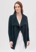 Load image into Gallery viewer, Possum and Merino  100206 Jolie Jacket - You&#39;ll welcome the wild, wintry weather when you&#39;re wearing the stunning Jolie Jacket, loved for effortless comfort, timeless ease, and featherweight warmth. Wear it open or wrap yourself up with the waist tie when jack frost starts to bite. This feminine, longline silhouette features a flattering waterfall collar, allowing you to flip this piece upside down and style it a bunch of different ways.