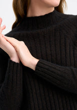 Load image into Gallery viewer, Possum and Merino

100212 Emilia Sweater - Fitted and flattering, this smart sweater features rib detail, a funnel neck, side splits and raglan sleeves. Pair it with the Emilia Skirt for an unforgettable top-to-toe look.&nbsp;

Made in New Zealand from an exclusive Merinomink blend of 50% ZQ Merino, 40% Brushtail possum and 10% Mulberry silk.