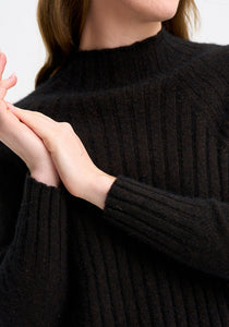 Possum and Merino

100212 Emilia Sweater - Fitted and flattering, this smart sweater features rib detail, a funnel neck, side splits and raglan sleeves. Pair it with the Emilia Skirt for an unforgettable top-to-toe look.&nbsp;

Made in New Zealand from an exclusive Merinomink blend of 50% ZQ Merino, 40% Brushtail possum and 10% Mulberry silk.