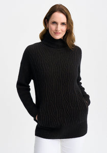 Possum and Merino

100295 Neve Sweater - Keep the cool out in style with the Neve Sweater. Designed with a longer silhouette for everyday comfort, it can easily dress up or down. Featuring cable detail through the body and a rib roll neck and sleeves, every detail is thoughtfully considered. Kangaroo pockets will keep cold hands cosy. Classic fit.&nbsp;

Made in New Zealand from an exclusive Merinomink blend of 50% ZQ Merino, 40% Brushtail possum and 10% Mulberry silk.