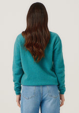 Load image into Gallery viewer, Possum and Merino

100296 Mia Crew - The go-to crew that you&#39;ll wear on repeat. This ageless style has a slim, classic fit and is short but not cropped in length. It features new Merinomink branding. Team it with the Essential Snood to effortlessly transform it into a rollneck.&nbsp;

Made in New Zealand from an exclusive Merinomink blend of 50% ZQ Merino, 40% Brushtail possum and 10% Mulberry silk.
