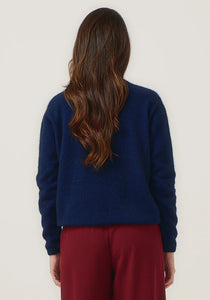 Possum and Merino

100296 Mia Crew - The go-to crew that you'll wear on repeat. This ageless style has a slim, classic fit and is short but not cropped in length. It features new Merinomink branding. Team it with the Essential Snood to effortlessly transform it into a rollneck.&nbsp;

Made in New Zealand from an exclusive Merinomink blend of 50% ZQ Merino, 40% Brushtail possum and 10% Mulberry silk.