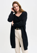 Load image into Gallery viewer, Possum and Merino

100297 Karla Coat Cardi - Looking for a longline cardi? Then you&#39;ve found it. This simple style has a long silhouette and two pockets will keep your hands cosy. Relaxed fit.&nbsp;

Made in New Zealand from an exclusive Merinomink blend of 50% ZQ Merino, 40% Brushtail possum and 10% Mulberry silk.