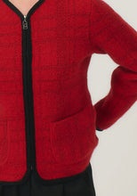 Load image into Gallery viewer, Possum and Merino

100298 Eloise Jacket - Eloise is all about style and grace. A refined silhouette and soft v neckline is met with a zipper that comes down to a curved front hem. A Merinomink zip pull and pockets add to the thoughtful design of this jacket. With a felted finish and subtle check detail, this new jacket is poised to become a highly coveted piece. Slim fit.&nbsp;

Made in New Zealand from an exclusive Merinomink blend of 50% ZQ Merino, 40% Brushtail possum and 10% Mulberry silk.