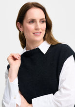 Load image into Gallery viewer, Possum and Merino

100299 Claudia Vest - Worn with bare arms in warmer weather, or layered over a shirt or merino top in winter, the Claudia has you covered for any occasion. Subtle angled stitch detail features on the front, and a dipped back hem delivers and elongating silhouette. Classic fit.&nbsp;

Made in New Zealand from an exclusive Merinomink blend of 50% ZQ Merino, 40% Brushtail possum and 10% Mulberry silk.