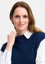 Load image into Gallery viewer, Possum and Merino

100299 Claudia Vest - Worn with bare arms in warmer weather, or layered over a shirt or merino top in winter, the Claudia has you covered for any occasion. Subtle angled stitch detail features on the front, and a dipped back hem delivers and elongating silhouette. Classic fit.&nbsp;

Made in New Zealand from an exclusive Merinomink blend of 50% ZQ Merino, 40% Brushtail possum and 10% Mulberry silk.