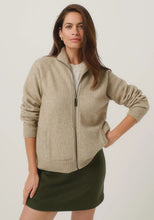 Load image into Gallery viewer, Possum and Merino

100300 Arianne Jacket - The Arianne is that everyday jacket you&#39;ll reach for all the time. Paired with jeans or chinos, it has a smart casual look and an interesting textural knit. Topped off with pockets and a stylish Merinomink zip pull, it&#39;s designed to keep you warm without weighing you down. Classic fit.&nbsp;

Made in New Zealand from an exclusive Merinomink blend of 50% ZQ Merino, 40% Brushtail possum and 10% Mulberry silk.