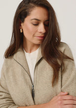 Load image into Gallery viewer, Possum and Merino

100300 Arianne Jacket - The Arianne is that everyday jacket you&#39;ll reach for all the time. Paired with jeans or chinos, it has a smart casual look and an interesting textural knit. Topped off with pockets and a stylish Merinomink zip pull, it&#39;s designed to keep you warm without weighing you down. Classic fit.&nbsp;

Made in New Zealand from an exclusive Merinomink blend of 50% ZQ Merino, 40% Brushtail possum and 10% Mulberry silk.