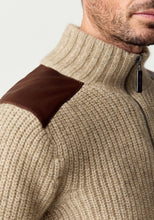 Load image into Gallery viewer, Possum and Merino

100392 Forrester Jacket - Crafted with a distinctive fisherman rib knit, this jacket combines timeless design with considered detailing. Leather shoulder patches and leather-trimmed pockets lend a heritage-inspired character, while the signature Merinomink zip pull provides a refined finishing touch. A versatile layer designed for enduring style and comfort.

Made in New Zealand from a blend of 40% possum fur, 50% ZQ merino and 10% mulberry silk.