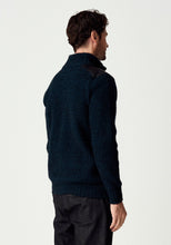 Load image into Gallery viewer, Possum and Merino

100392 Forrester Jacket - Crafted with a distinctive fisherman rib knit, this jacket combines timeless design with considered detailing. Leather shoulder patches and leather-trimmed pockets lend a heritage-inspired character, while the signature Merinomink zip pull provides a refined finishing touch. A versatile layer designed for enduring style and comfort.

Made in New Zealand from a blend of 40% possum fur, 50% ZQ merino and 10% mulberry silk.