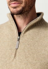 Load image into Gallery viewer, Possum and Merino

100492 Whittaker Half Zip – Defined by its contrast striped collar and signature Merinomink zip pull, this enduring favourite balances comfort and style with ease. The classic silhouette layers effortlessly and transitions seamlessly between casual and elevated dressing, making it a piece you'll return to season after season. A classic fit.

Made in New Zealand from an exclusive Merinomink blend of 50% ZQ Merino, 40% Brushtail possum and 10% Mulberry silk.