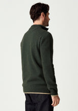 Load image into Gallery viewer, Possum and Merino

100492 Whittaker Half Zip – Defined by its contrast striped collar and signature Merinomink zip pull, this enduring favourite balances comfort and style with ease. The classic silhouette layers effortlessly and transitions seamlessly between casual and elevated dressing, making it a piece you'll return to season after season. A classic fit.

Made in New Zealand from an exclusive Merinomink blend of 50% ZQ Merino, 40% Brushtail possum and 10% Mulberry silk.