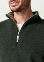 Load image into Gallery viewer, Possum and Merino

100492 Whittaker Half Zip – Defined by its contrast striped collar and signature Merinomink zip pull, this enduring favourite balances comfort and style with ease. The classic silhouette layers effortlessly and transitions seamlessly between casual and elevated dressing, making it a piece you'll return to season after season. A classic fit.

Made in New Zealand from an exclusive Merinomink blend of 50% ZQ Merino, 40% Brushtail possum and 10% Mulberry silk.