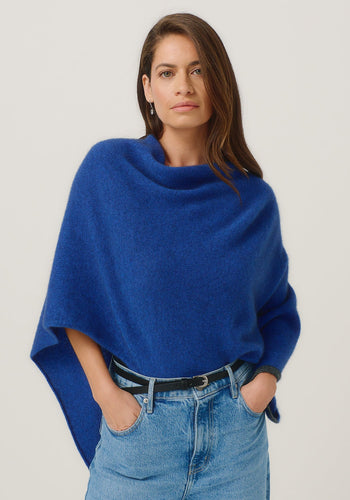 Possum and Merino

1623 Two Tone Poncho - A fan favourite, the Two Tone Poncho is a winner. With a relaxed fit and contrast coloured tipping it's cut for comfort and style. With a rainbow of colour options on offer, this is one you'll want in each colour! Classic fit. 

Made in New Zealand from an exclusive Merinomink blend of 50% ZQ Merino, 40% Brushtail possum and 10% Mulberry silk.