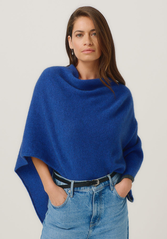Possum and Merino

1623 Two Tone Poncho - A fan favourite, the Two Tone Poncho is a winner. With a relaxed fit and contrast coloured tipping it's cut for comfort and style. With a rainbow of colour options on offer, this is one you'll want in each colour! Classic fit. 

Made in New Zealand from an exclusive Merinomink blend of 50% ZQ Merino, 40% Brushtail possum and 10% Mulberry silk.