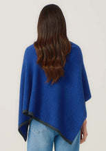 Load image into Gallery viewer, Possum and Merino

1623 Two Tone Poncho - A fan favourite, the Two Tone Poncho is a winner. With a relaxed fit and contrast coloured tipping it&#39;s cut for comfort and style. With a rainbow of colour options on offer, this is one you&#39;ll want in each colour! Classic fit.&nbsp;

Made in New Zealand from an exclusive Merinomink blend of 50% ZQ Merino, 40% Brushtail possum and 10% Mulberry silk.