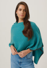 Load image into Gallery viewer, Possum and Merino

1623 Two Tone Poncho - A fan favourite, the Two Tone Poncho is a winner. With a relaxed fit and contrast coloured tipping it&#39;s cut for comfort and style. With a rainbow of colour options on offer, this is one you&#39;ll want in each colour! Classic fit.&nbsp;

Made in New Zealand from an exclusive Merinomink blend of 50% ZQ Merino, 40% Brushtail possum and 10% Mulberry silk.