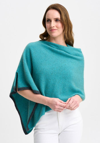 Possum and Merino

1623 Two Tone Poncho - A fan favourite, the Two Tone Poncho is a winner. With a relaxed fit and contrast coloured tipping it's cut for comfort and style. With a rainbow of colour options on offer, this is one you'll want in each colour! Classic fit. 

Made in New Zealand from an exclusive Merinomink blend of 50% ZQ Merino, 40% Brushtail possum and 10% Mulberry silk.
