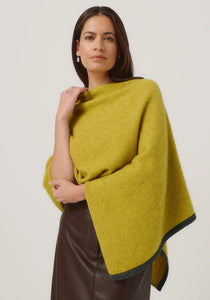 Possum and Merino

1623 Two Tone Poncho - A fan favourite, the Two Tone Poncho is a winner. With a relaxed fit and contrast coloured tipping it's cut for comfort and style. With a rainbow of colour options on offer, this is one you'll want in each colour! Classic fit.&nbsp;

Made in New Zealand from an exclusive Merinomink blend of 50% ZQ Merino, 40% Brushtail possum and 10% Mulberry silk.