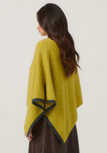 Load image into Gallery viewer, Possum and Merino

1623 Two Tone Poncho - A fan favourite, the Two Tone Poncho is a winner. With a relaxed fit and contrast coloured tipping it&#39;s cut for comfort and style. With a rainbow of colour options on offer, this is one you&#39;ll want in each colour! Classic fit.&nbsp;

Made in New Zealand from an exclusive Merinomink blend of 50% ZQ Merino, 40% Brushtail possum and 10% Mulberry silk.