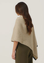 Load image into Gallery viewer, Possum and Merino

1623 Two Tone Poncho - A fan favourite, the Two Tone Poncho is a winner. With a relaxed fit and contrast coloured tipping it&#39;s cut for comfort and style. With a rainbow of colour options on offer, this is one you&#39;ll want in each colour! Classic fit.&nbsp;

Made in New Zealand from an exclusive Merinomink blend of 50% ZQ Merino, 40% Brushtail possum and 10% Mulberry silk.