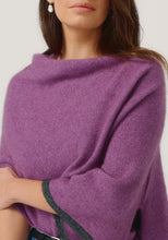 Load image into Gallery viewer, Possum and Merino

1623 Two Tone Poncho - A fan favourite, the Two Tone Poncho is a winner. With a relaxed fit and contrast coloured tipping it&#39;s cut for comfort and style. With a rainbow of colour options on offer, this is one you&#39;ll want in each colour! Classic fit.&nbsp;

Made in New Zealand from an exclusive Merinomink blend of 50% ZQ Merino, 40% Brushtail possum and 10% Mulberry silk.