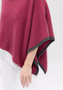 Possum and Merino  1623 Two Tone Poncho - One colour is never enough in this amazing one-size-fits-all wardrobe staple.  This easy throw-on piece can be worn various ways to create a host of different looks.  A touch of contrast tipping at the hem adds a little designer detail.