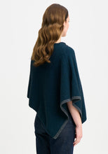 Load image into Gallery viewer, Possum and Merino

1623 Two Tone Poncho - A fan favourite, the Two Tone Poncho is a winner. With a relaxed fit and contrast coloured tipping it&#39;s cut for comfort and style. With a rainbow of colour options on offer, this is one you&#39;ll want in each colour! Classic fit.&nbsp;

Made in New Zealand from an exclusive Merinomink blend of 50% ZQ Merino, 40% Brushtail possum and 10% Mulberry silk.