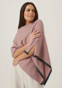Possum and Merino

1623 Two Tone Poncho - A fan favourite, the Two Tone Poncho is a winner. With a relaxed fit and contrast coloured tipping it's cut for comfort and style. With a rainbow of colour options on offer, this is one you'll want in each colour! Classic fit.&nbsp;

Made in New Zealand from an exclusive Merinomink blend of 50% ZQ Merino, 40% Brushtail possum and 10% Mulberry silk.
