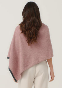 Possum and Merino

1623 Two Tone Poncho - A fan favourite, the Two Tone Poncho is a winner. With a relaxed fit and contrast coloured tipping it's cut for comfort and style. With a rainbow of colour options on offer, this is one you'll want in each colour! Classic fit.&nbsp;

Made in New Zealand from an exclusive Merinomink blend of 50% ZQ Merino, 40% Brushtail possum and 10% Mulberry silk.