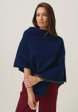 Load image into Gallery viewer, Possum and Merino

1623 Two Tone Poncho - A fan favourite, the Two Tone Poncho is a winner. With a relaxed fit and contrast coloured tipping it&#39;s cut for comfort and style. With a rainbow of colour options on offer, this is one you&#39;ll want in each colour! Classic fit.&nbsp;

Made in New Zealand from an exclusive Merinomink blend of 50% ZQ Merino, 40% Brushtail possum and 10% Mulberry silk.